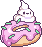 A pink frosted donut with sprinkles and a dollup of ghost looking cream.