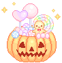 A jack-o-lantern filled with pink and purple sweets.